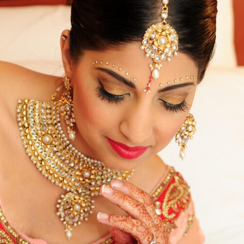 Glam makeup for indian bride with full updo